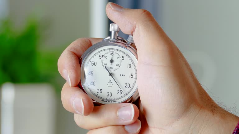 Hand with a stopwatch